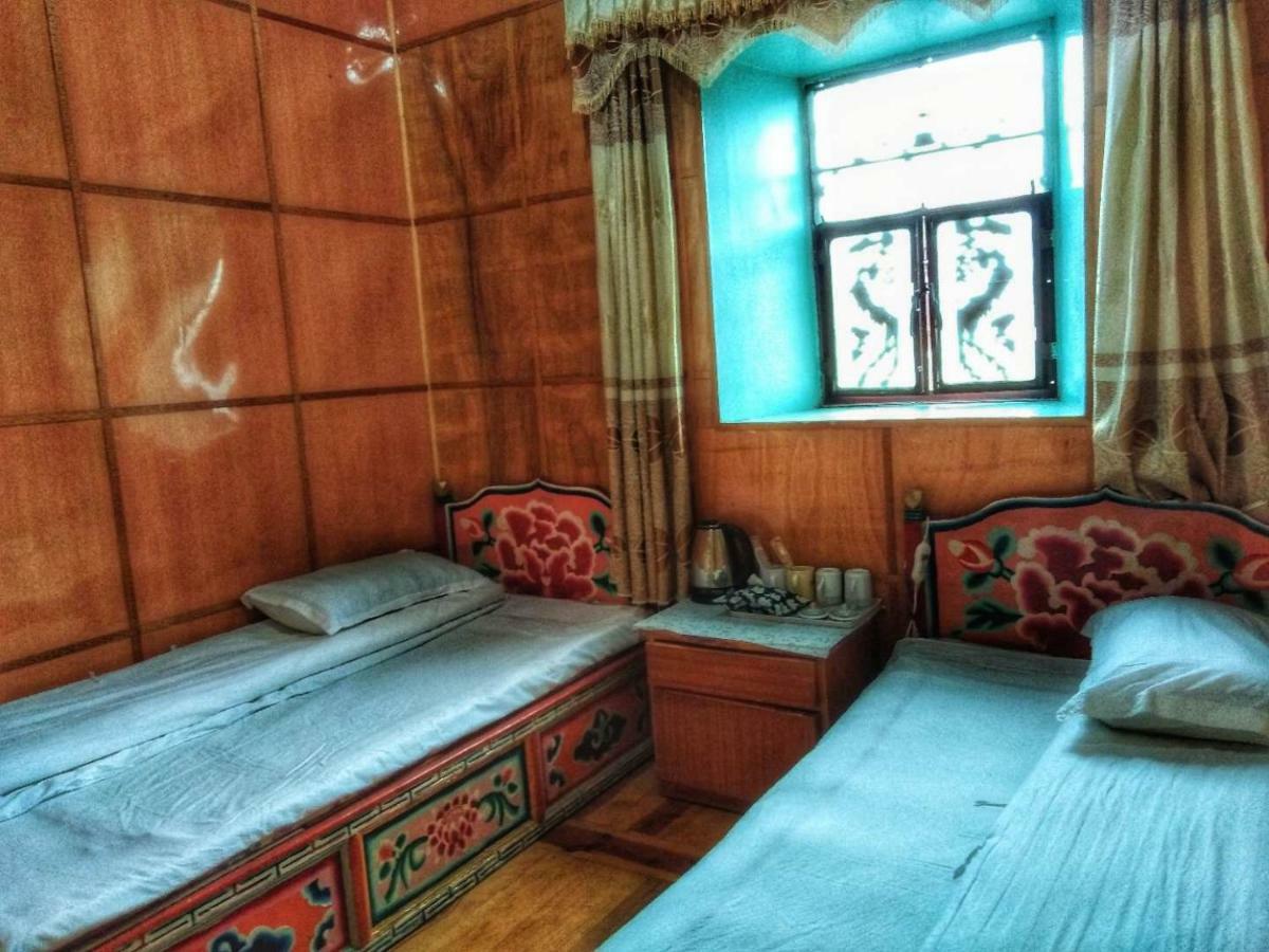 Zishuo Zihua Guest House Daocheng Exterior photo